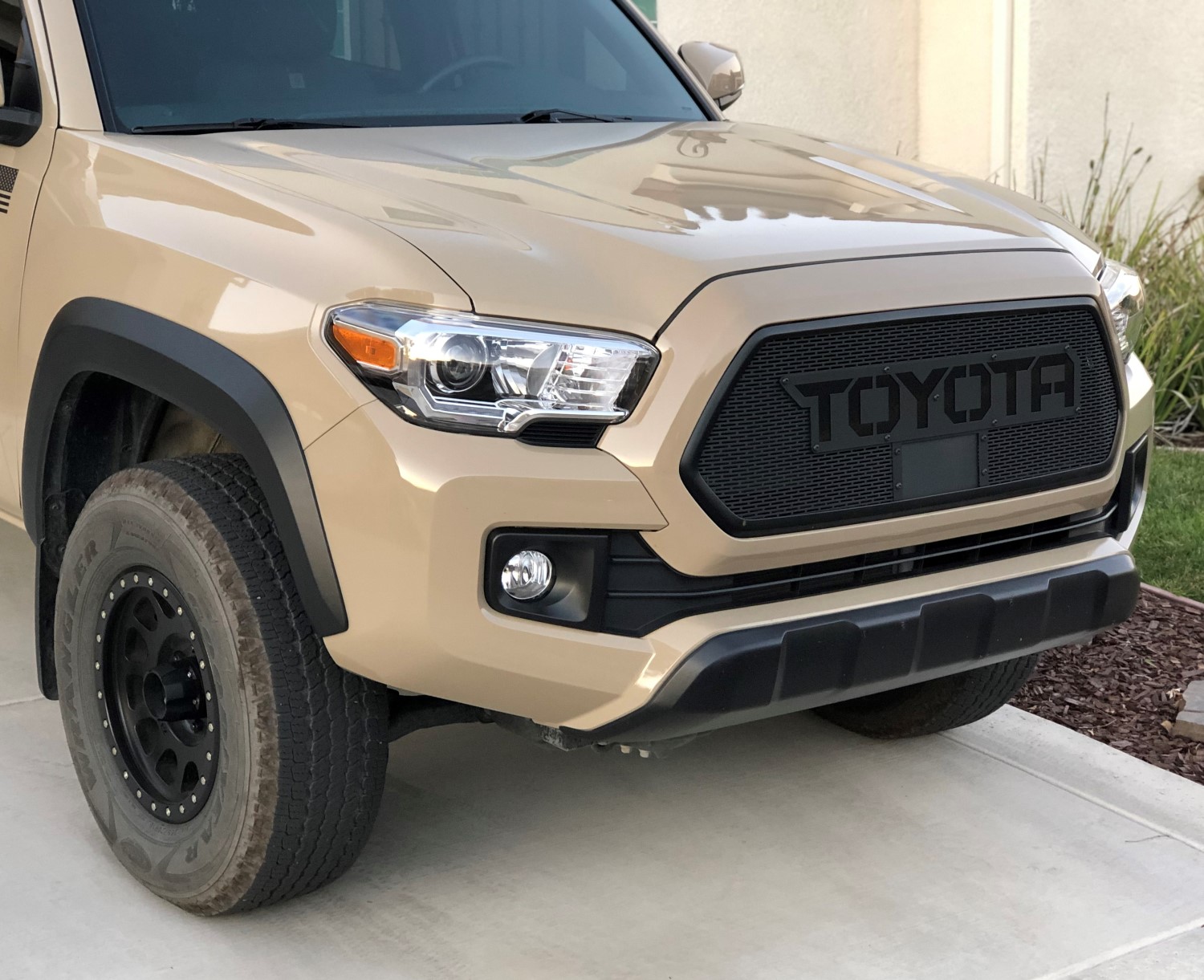 Black is Back: Quicksand Tacoma's Custom Grille in Gloss and Flat Black
